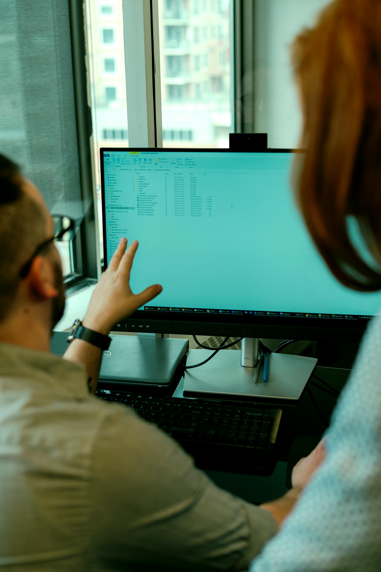 LAN Solutions team working in their Calgary office