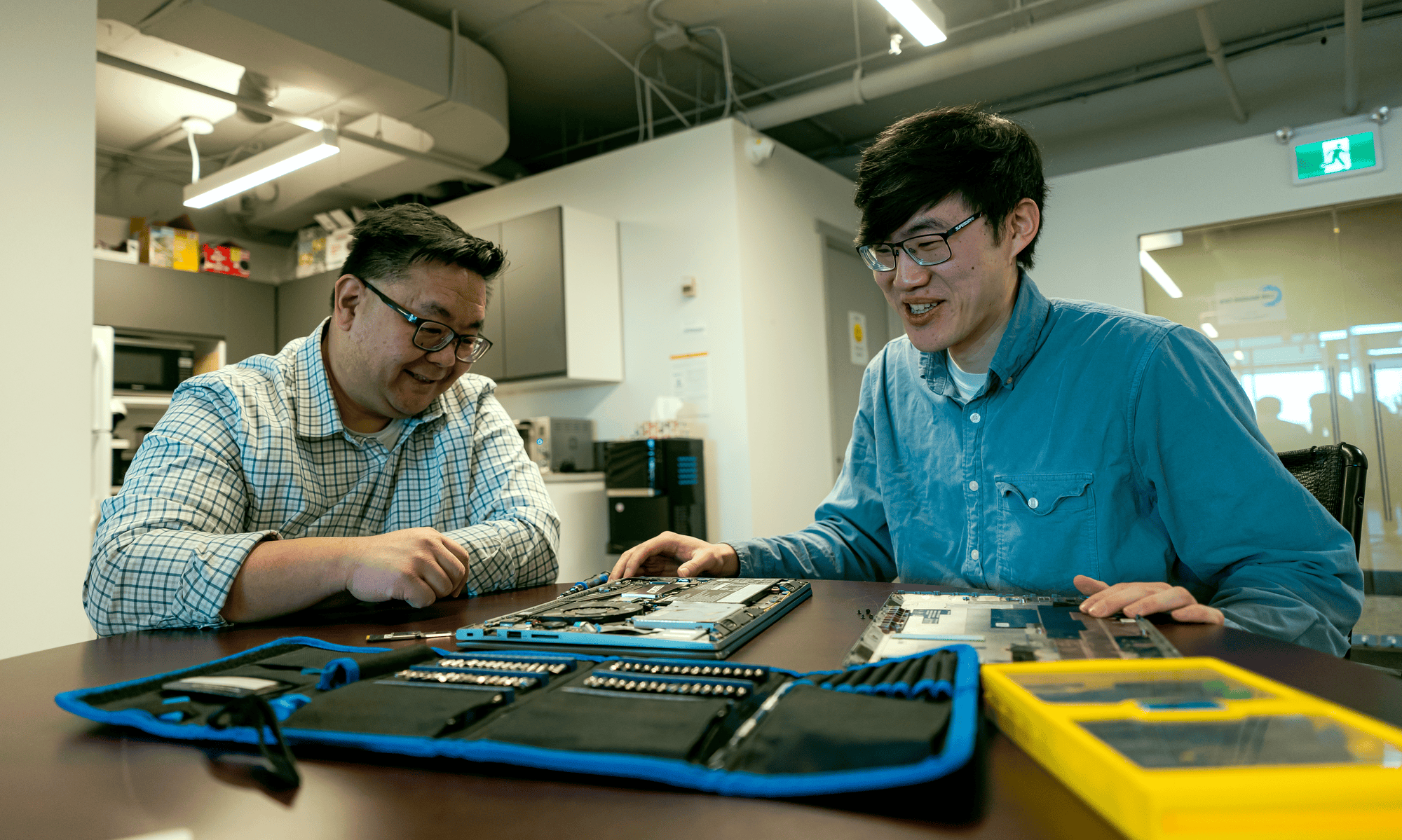 LAN Solutions professionals working with a client
