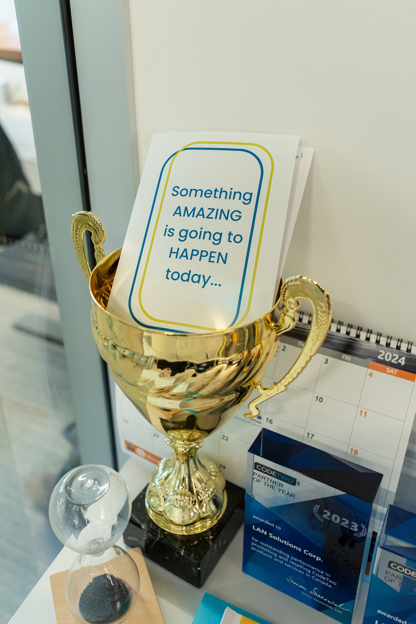 A trophy on a desk in the LAN office